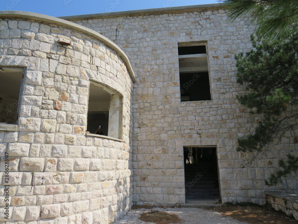 door in old house Abandon prison Goli otok croatia
