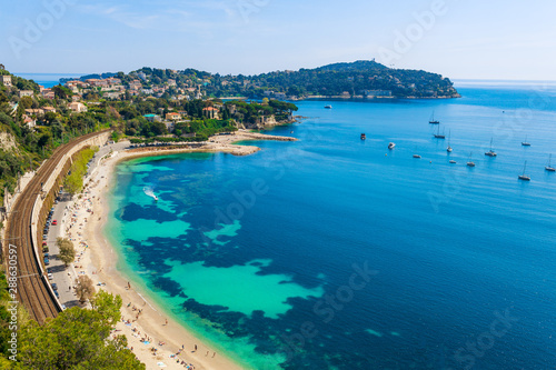 Landscape panoramic coast view between Nice and Monaco, Cote d'Azur, France, South Europe. Beautiful luxury resort of French riviera. Famous tourist destination with nice beach on Mediterranean sea © oleg_p_100