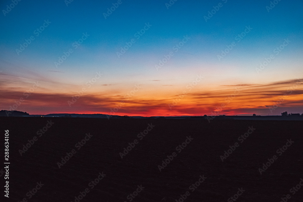 sunset over a wide field