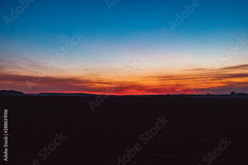 sunset over a wide field