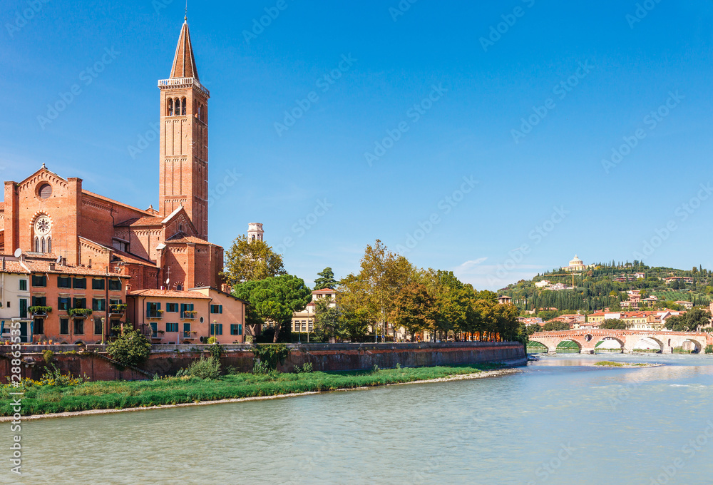 Panoramic cityscape aerial view on Verona historical center, bridge and Adige river. Famous travel destination in Italy. Old town where lived Romeo and Juliet from Shakespeare story Panoramic cityscape aerial view on Verona historical center, bridge and Adige river. Famous travel destination in Italy. Old town where lived Romeo and Juliet from Shakespeare story