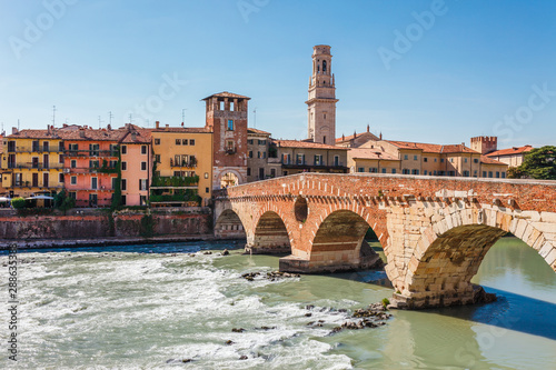 Panoramic cityscape aerial view on Verona historical center, bridge and Adige river. Famous travel destination in Italy. Old town where lived Romeo and Juliet from Shakespeare story