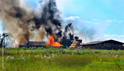 burning agricultural warehouses