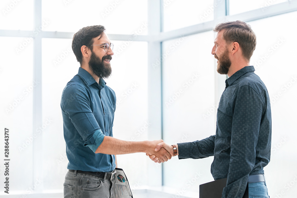financial partners shaking hands . concept of cooperation