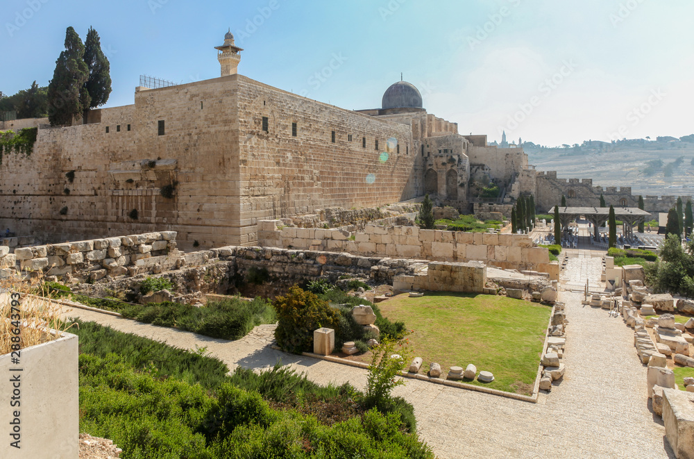 Southern Wall of Temple Mount at southwestern corner in the Jerusalem old town. The dome is the Al Aqsa Mosque.