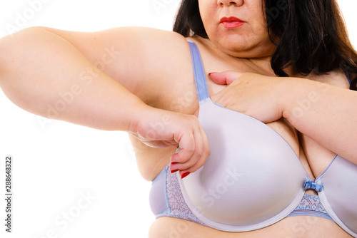Fat woman big breast wearing bra Stock Photo