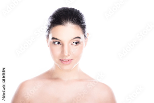 Beauty woman face isolate in white background. Young caucasian girl  perfect skin  cosmetic  spa  beauty treatment concept. Look to the right  copy space  smile.