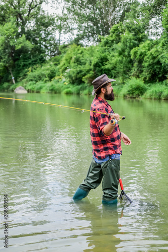 Fly fishing may well be considered most beautiful of all rural sports. Fisherman lucky catching fish. Good things come to those who bait. Fishing outdoor sport. Fishing hobby. Teach man to fish