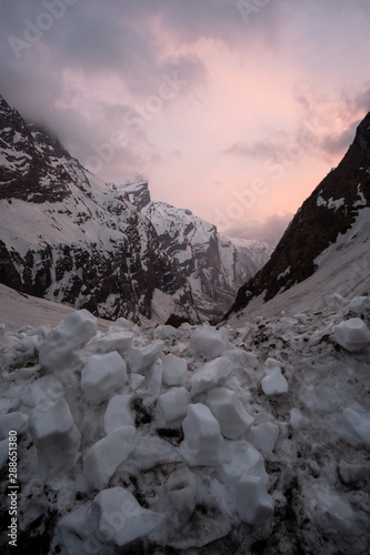 Landscape with Machapuchare-Fishtail peak view red sky from Tadapani during trekking in Himalaya Mountains, Nepal. photo