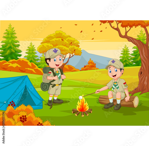 Cartoon scout with tent and camp fire