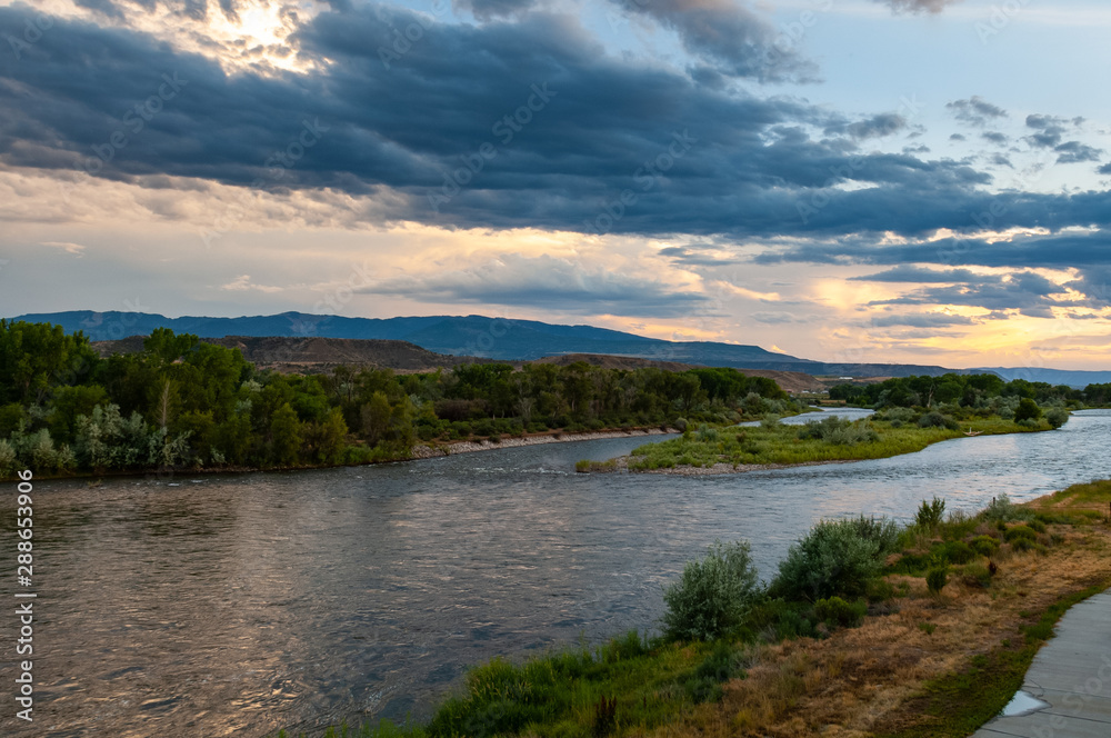 Sunset view of Colorado River in Silt in Colorado, USA. Long Exposure low light photograph. Sunset view of Colorado River in Silt in Colorado, USA. Long Exposure low light photograph.