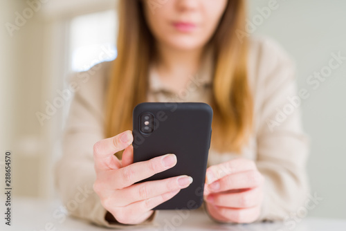 Close up of woman using smartphone