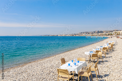 Landscape panoramic view of Nice, Cote d'Azur, France, South Europe. Beautiful city and luxury resort of French riviera. Famous tourist destination with nice beach on Mediterranean sea © oleg_p_100