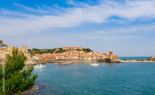 Fototapeta Naklejka Na Ścianę i Meble -  Panorama of Collioure harbour, Languedoc-Roussillon, France, South Europe. Ancient town with old castle on Vermillion coast of French riviera. Famous tourist destination on Mediterranean sea