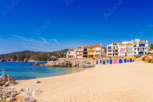 Sea landscape with Calella de Palafrugell, Catalonia, Spain near of Barcelona. Scenic fisherman village with nice sand beach and clear blue water in nice bay. Famous tourist destination in Costa Brava © oleg_p_100