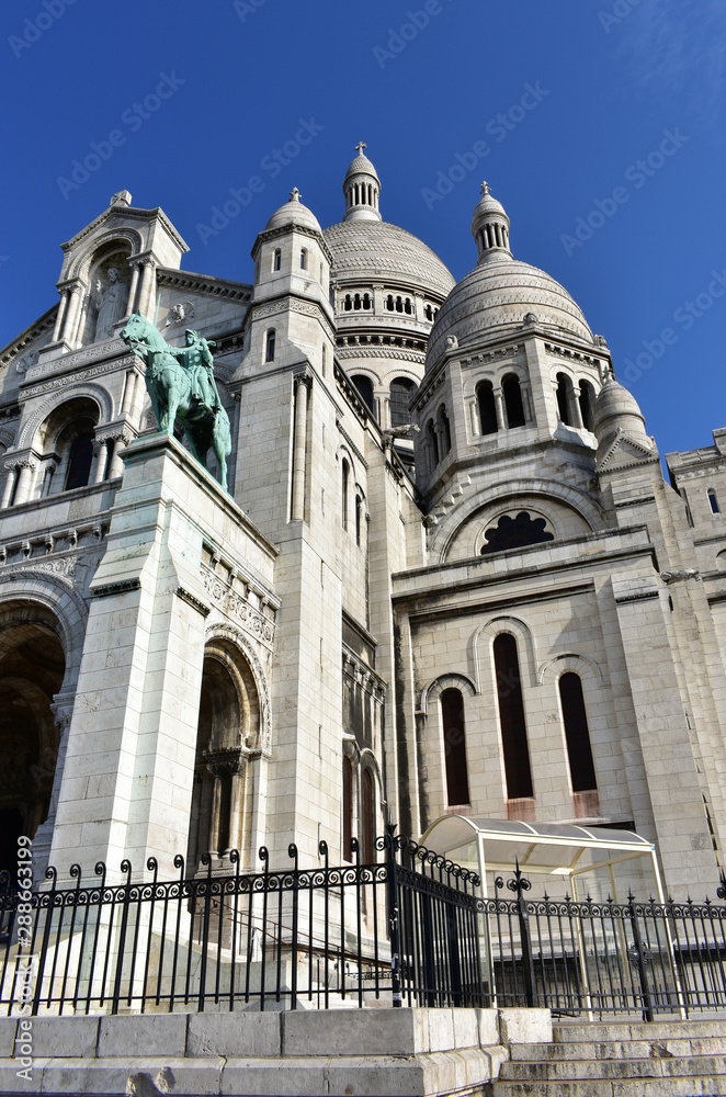 Basilique du Sacre Coeur with blue sky. Paris, France.