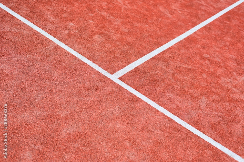 Photo of red tennis court
