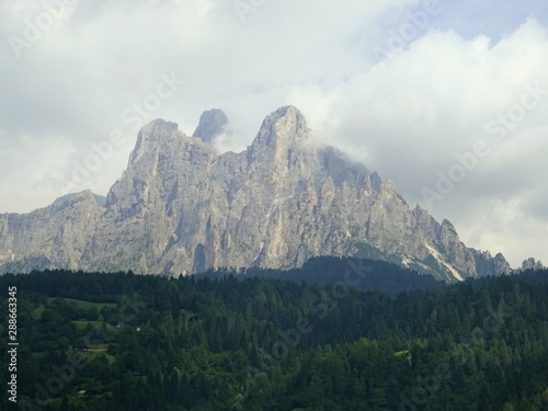 The Pale di San Martino  Some of the most famous peaks of the Dolomites that emerge from the clouds of Trentino  near the town of San Martino di Castrozza  Italy - August 2019.