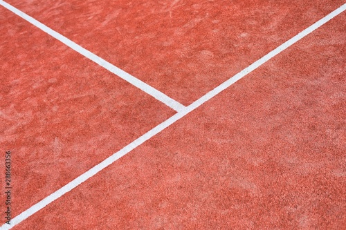 Photo of red tennis court