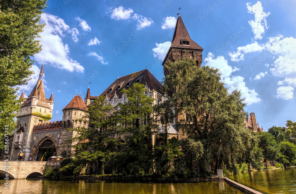 Decorative castle Vajdahunyad in the historical park Varoshliget in Budapest, Hungary. The Millennium of the Hungarian State, 1896