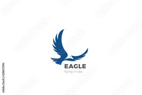 Eagle Flying Soaring Logo abstract design vector template Negative space style. Falcon Hawk Logotype concept icon.
