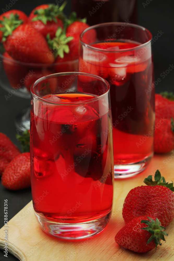 Glasses with strawberry drink with ice Glasses with strawberry drink with ice