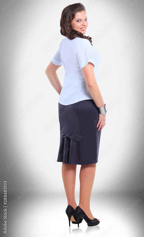 side view. stylish business woman looking at camera side view. stylish business woman looking at camera
