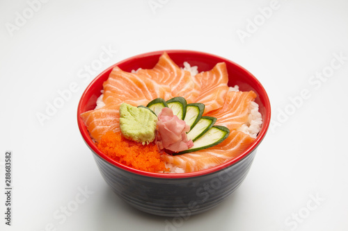 Salmon donburi or slice raw salmon put on cooked rice.