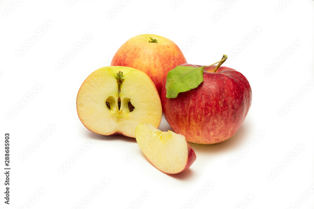 Ripe red apple with apple leaf. Isolated on a white background. Ripe red apple with apple leaf. Isolated on a white background.