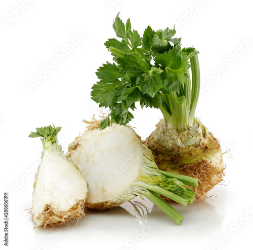Fresh celeriac root with slices isolated white background
