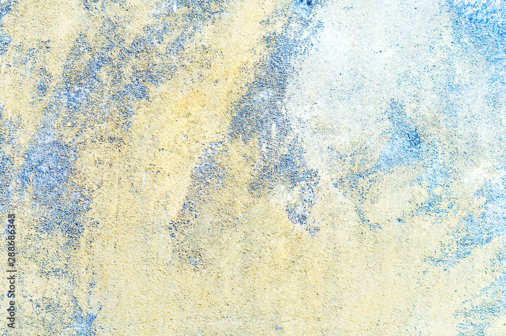 Abstract background. Damaged wall with traces of destruction. Rough and uneven surface of an old building. Abstract background. Damaged wall with traces of destruction. Rough and uneven surface of an old building.