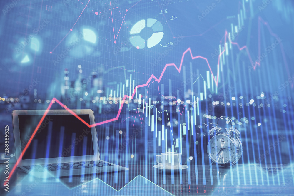 Forex market chart hologram and personal computer background. Double exposure. Concept of investment. Forex market chart hologram and personal computer background. Double exposure. Concept of investment.