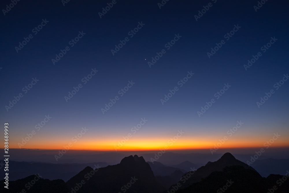 beautiful zodiacal light, stars and city light on the peak of the mountains. Doi luang chiang dao, Chiang dao national park, Chiang mai, Thailand beautiful zodiacal light, stars and city light on the peak of the mountains. Doi luang chiang dao, Chiang dao national park, Chiang mai, Thailand