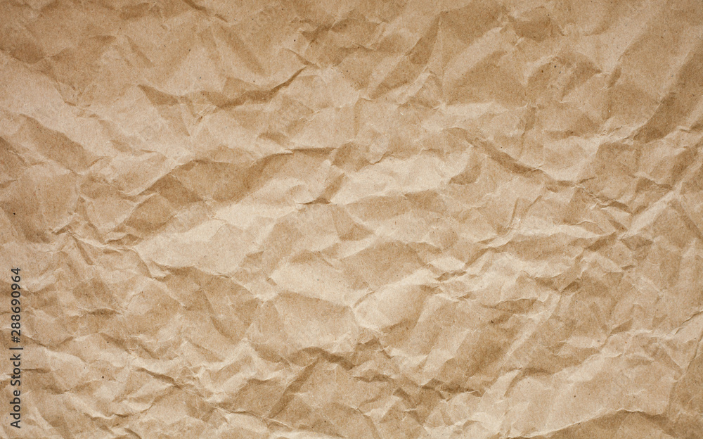 Brown crumpled paper background. Old paper texture.