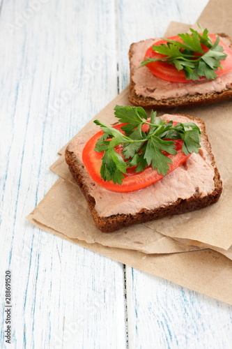 Delicious sandwiches for a snack on the table. 