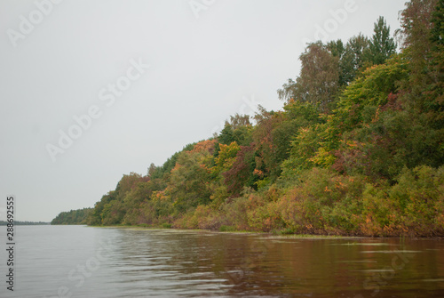 Autumn river on a cloudy day  calm on the river 