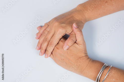 Close up senior woman hand clasp and thinking or consideration on white background