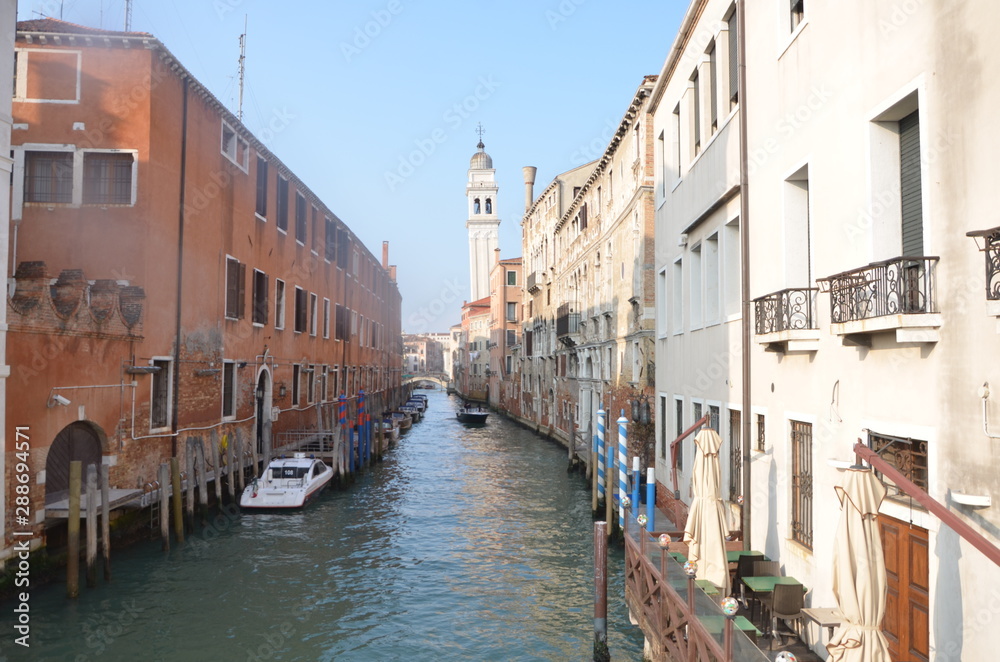 Old buildings along a narrow canal in Venice