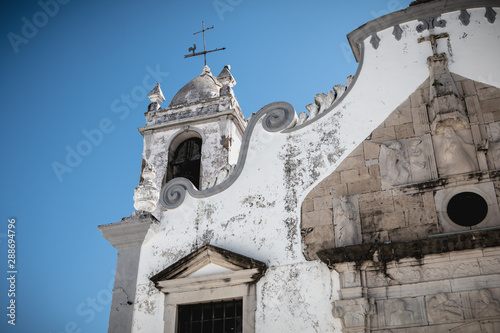 Architectural detail of the Church of Our Lady of Grace in Moncarapacho, Portugal photo
