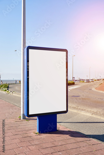 Mockup of a blank empty white advertising urban billboard at seaside on the street, space for design layout.
