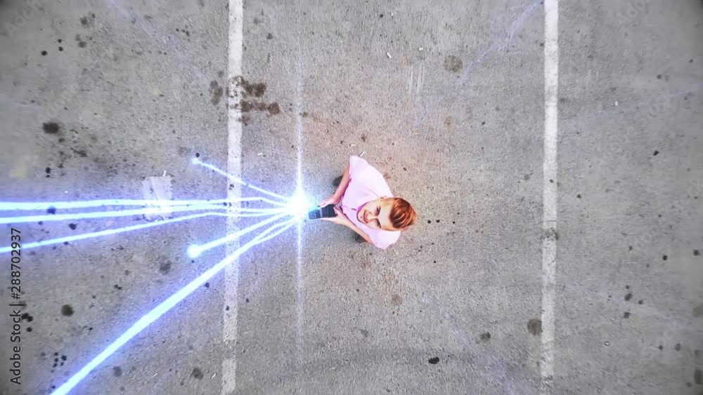 Young casual businessman uses smartphone Visualization of information lines flows are flying from smartphone into Global Network. Aerial drone shot
