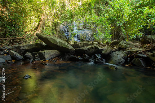 Ton Aow Yon Waterfall rich natural resources,in the forest,asia tropical areaat Island Phuket Thailand.