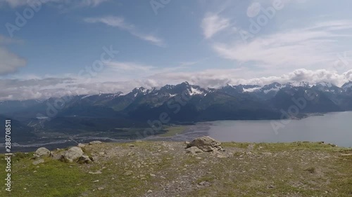 Majestic Panoramic View of Kenai Mountains, Resurrection Bay and Resurrection River from the Top of Marathon Mountain  near Seward Alaska on a Cloudy Day photo