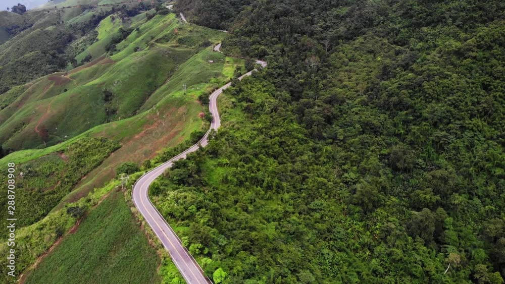 Aerial view of the winding road On the mountain and beautiful, suitable for holiday travel. Aerial view of the winding road On the mountain and beautiful, suitable for holiday travel.
