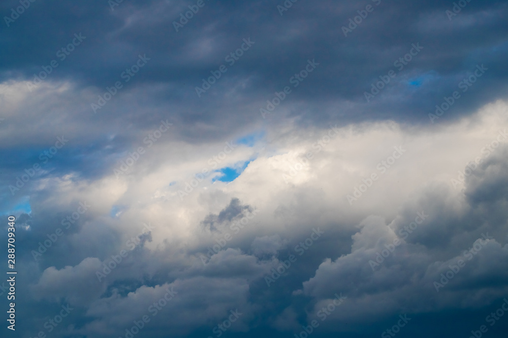 Blue Sky With Fluffy Clouds Abstract Background.