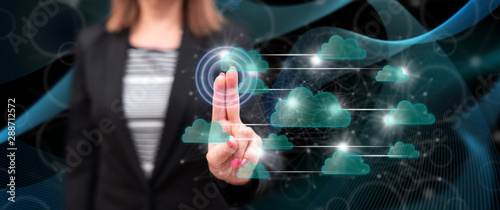 Woman touching a cloud networking concept