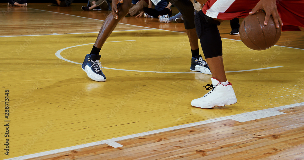 Fototapeta premium Professional basketball player in action on a sports arena