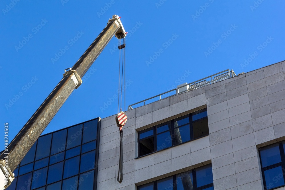Crane working on building