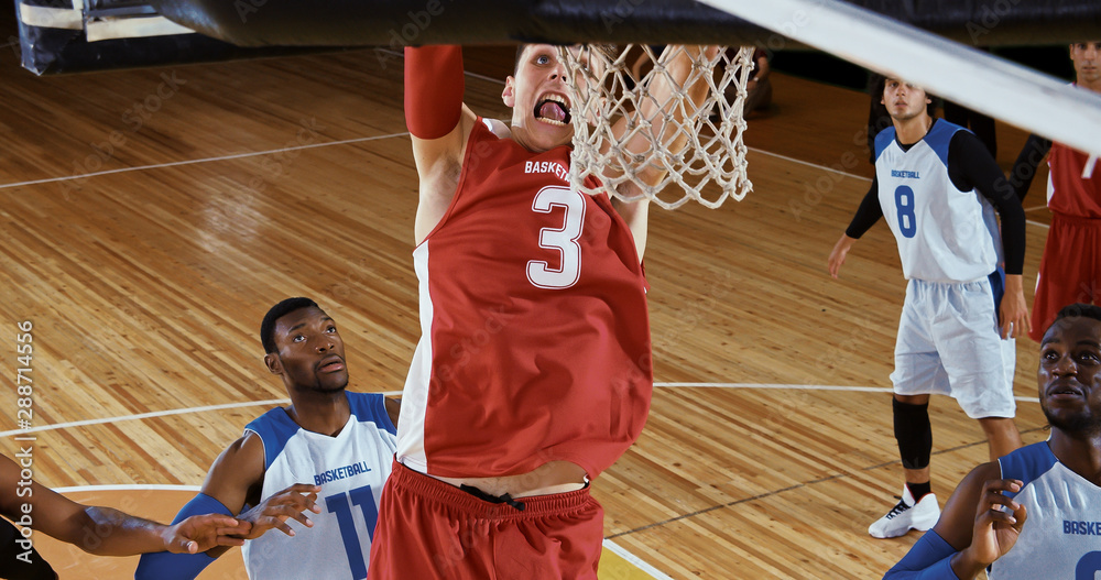 Fototapeta premium Professional basketball player in action on a sports arena