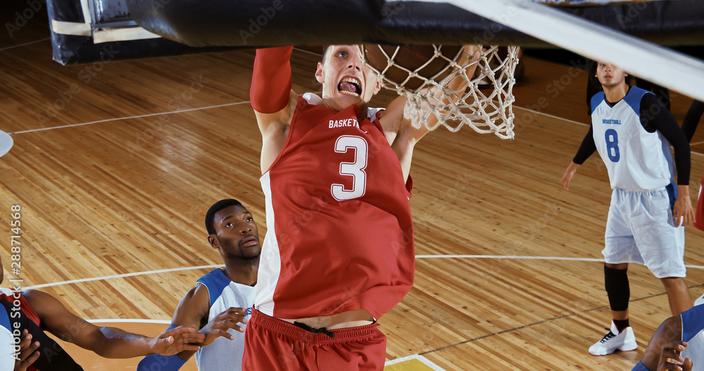 Fototapeta premium Professional basketball player in action on a sports arena